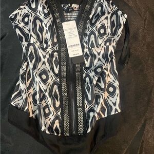 Bebe Black and White Asymmetrical Sleeveless Blouse